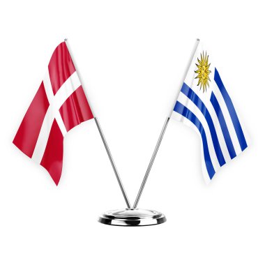 Two table flags isolated on white background 3d illustration, denmark and uruguay