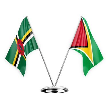 Two table flags isolated on white background 3d illustration, dominica and guyana