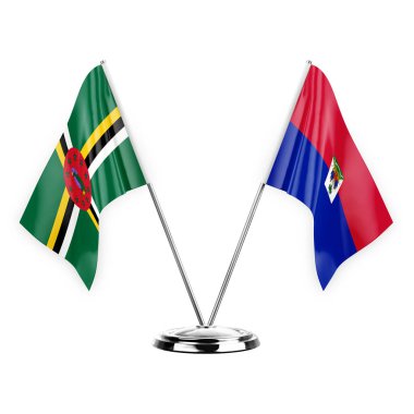 Two table flags isolated on white background 3d illustration, dominica and haiti