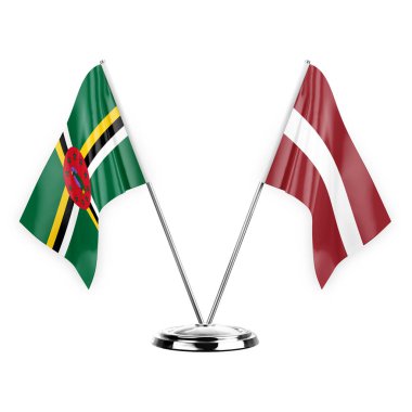 Two table flags isolated on white background 3d illustration, dominica and latvia
