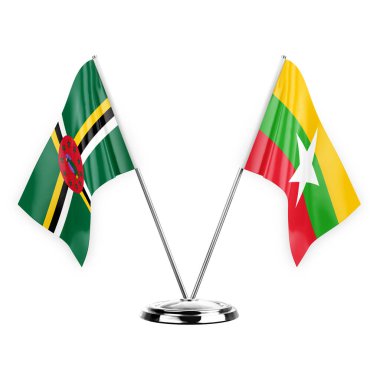Two table flags isolated on white background 3d illustration, dominica and myanmar