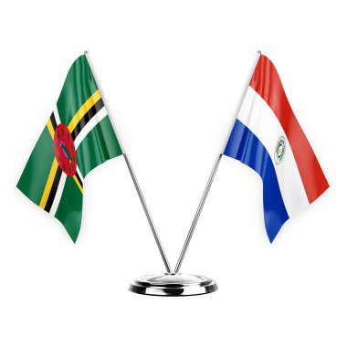 Two table flags isolated on white background 3d illustration, dominica and paraguay