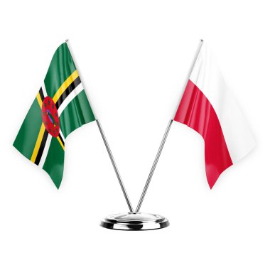 Two table flags isolated on white background 3d illustration, dominica and poland