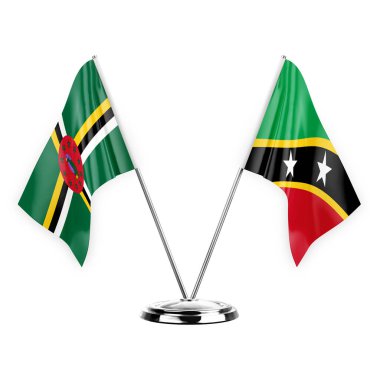 Two table flags isolated on white background 3d illustration, dominica and saint kitts and venis