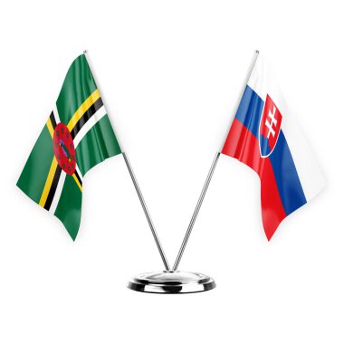 Two table flags isolated on white background 3d illustration, dominica and slovakia