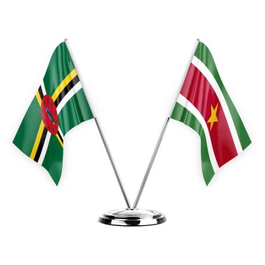 Two table flags isolated on white background 3d illustration, dominica and suriname