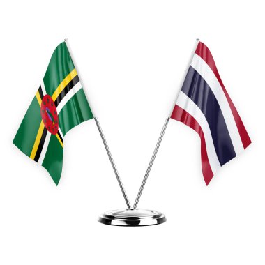 Two table flags isolated on white background 3d illustration, dominica and thailand