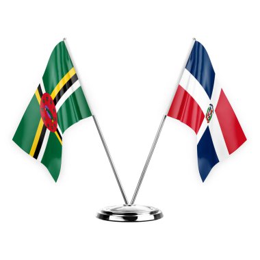 Two table flags isolated on white background 3d illustration, dominica and dominican republic