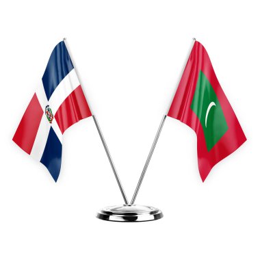 Two table flags isolated on white background 3d illustration, dominican republic and maldives