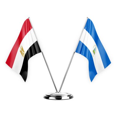 Two table flags isolated on white background 3d illustration, egypt and nicaragua