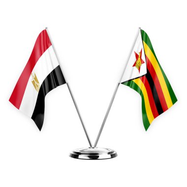 Two table flags isolated on white background 3d illustration, egypt and zimbabwe