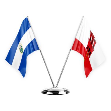 Two table flags isolated on white background 3d illustration, el salvador and gibraltar