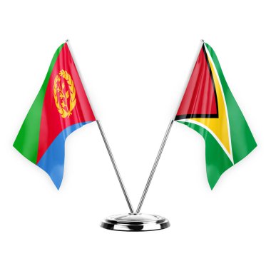 Two table flags isolated on white background 3d illustration, eritrea and guyana