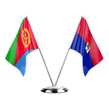 Two table flags isolated on white background 3d illustration, eritrea and haiti