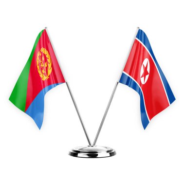 Two table flags isolated on white background 3d illustration, eritrea and north korea