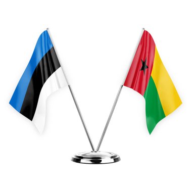 Two table flags isolated on white background 3d illustration, estonia and guinea-bissau