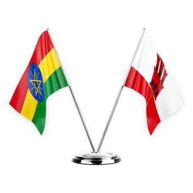 Two table flags isolated on white background 3d illustration, ethiopia and gibraltar