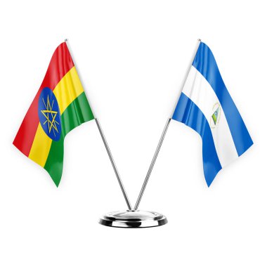 Two table flags isolated on white background 3d illustration, ethiopia and nicaragua