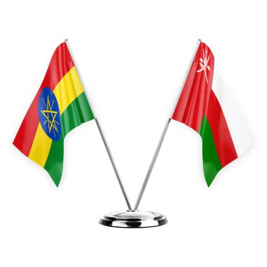 Two table flags isolated on white background 3d illustration, ethiopia and oman