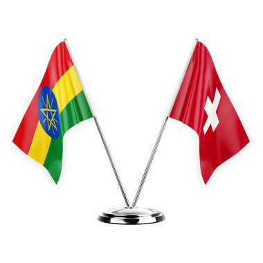 Two table flags isolated on white background 3d illustration, ethiopia and switzerland