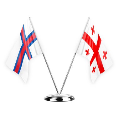 Two table flags isolated on white background 3d illustration, faroe islands and georgia