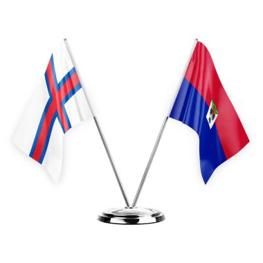 Two table flags isolated on white background 3d illustration, faroe islands and haiti