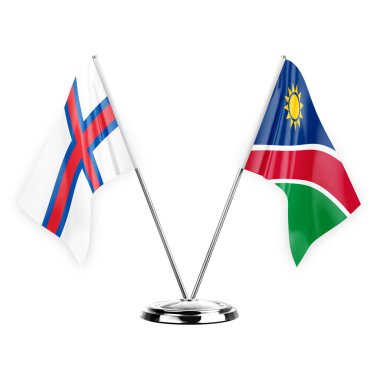 Two table flags isolated on white background 3d illustration, faroe islands and namibia