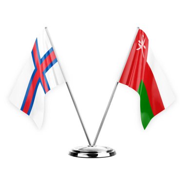 Two table flags isolated on white background 3d illustration, faroe islands and oman