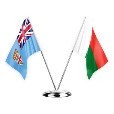 Two table flags isolated on white background 3d illustration, fiji and madagascar