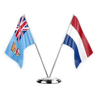 Two table flags isolated on white background 3d illustration, fiji and netherlands
