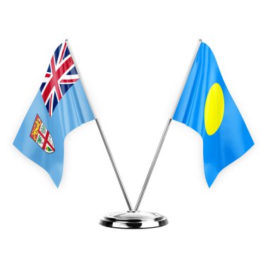 Two table flags isolated on white background 3d illustration, fiji and palau