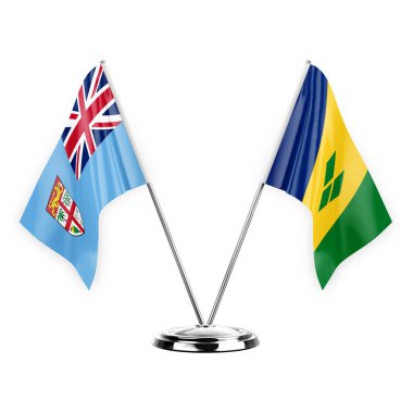 Two table flags isolated on white background 3d illustration, fiji and saint vincent and the grenadines