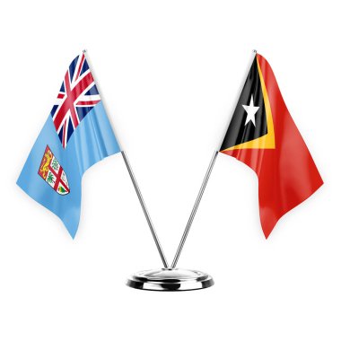 Two table flags isolated on white background 3d illustration, fiji and timor leste
