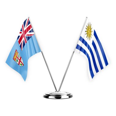 Two table flags isolated on white background 3d illustration, fiji and uruguay