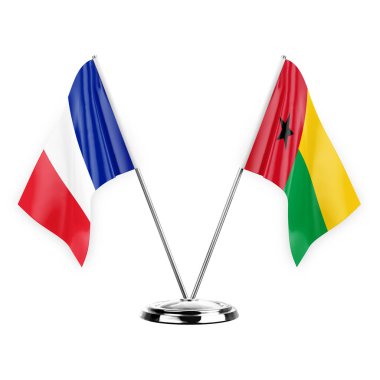 Two table flags isolated on white background 3d illustration, france and guinea-bissau