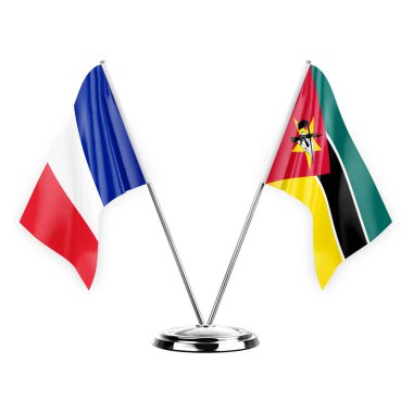 Two table flags isolated on white background 3d illustration, france and mozambique