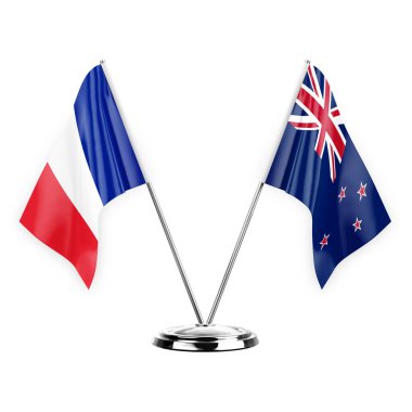 Two table flags isolated on white background 3d illustration, france and new zealand