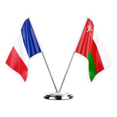 Two table flags isolated on white background 3d illustration, france and oman
