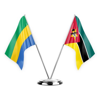 Two table flags isolated on white background 3d illustration, gabon and mozambique