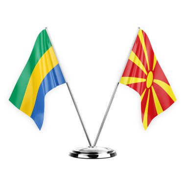 Two table flags isolated on white background 3d illustration, gabon and north macedonia