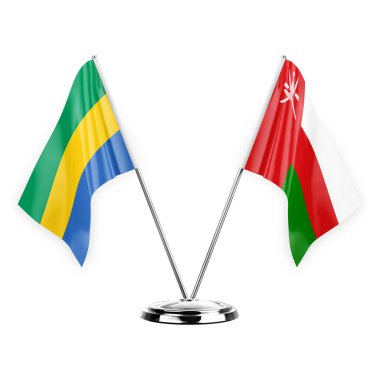 Two table flags isolated on white background 3d illustration, gabon and oman