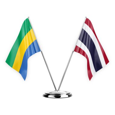 Two table flags isolated on white background 3d illustration, gabon and thailand