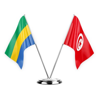 Two table flags isolated on white background 3d illustration, gabon and tunisia