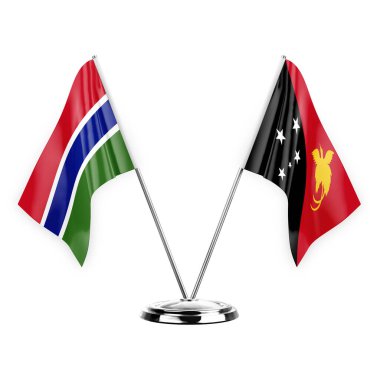 Two table flags isolated on white background 3d illustration, gambia and papua new guinea