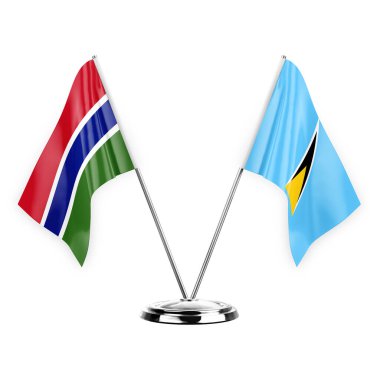 Two table flags isolated on white background 3d illustration, gambia and saint lucia