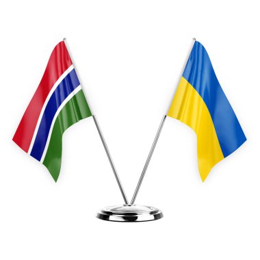 Two table flags isolated on white background 3d illustration, gambia and ukraine
