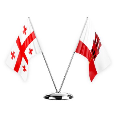 Two table flags isolated on white background 3d illustration, georgia and gibraltar