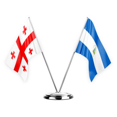 Two table flags isolated on white background 3d illustration, georgia and nicaragua