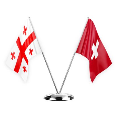 Two table flags isolated on white background 3d illustration, georgia and switzerland