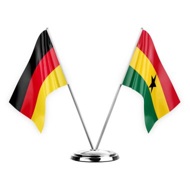 Two table flags isolated on white background 3d illustration, germany and ghana